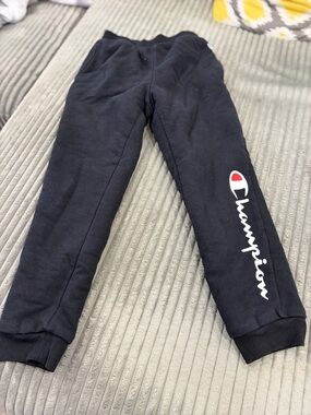 Champion Kids Fleece Lined Black Joggers with White Script and Red Logo